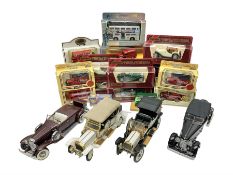 Four Franklin Mint 1:24 scale model cars