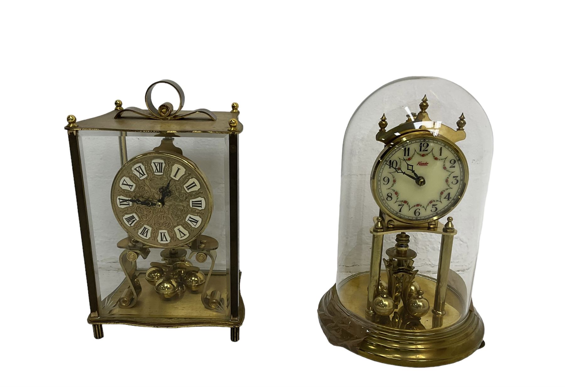 Two 20th century torsion clocks