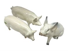 Three Beswick pigs