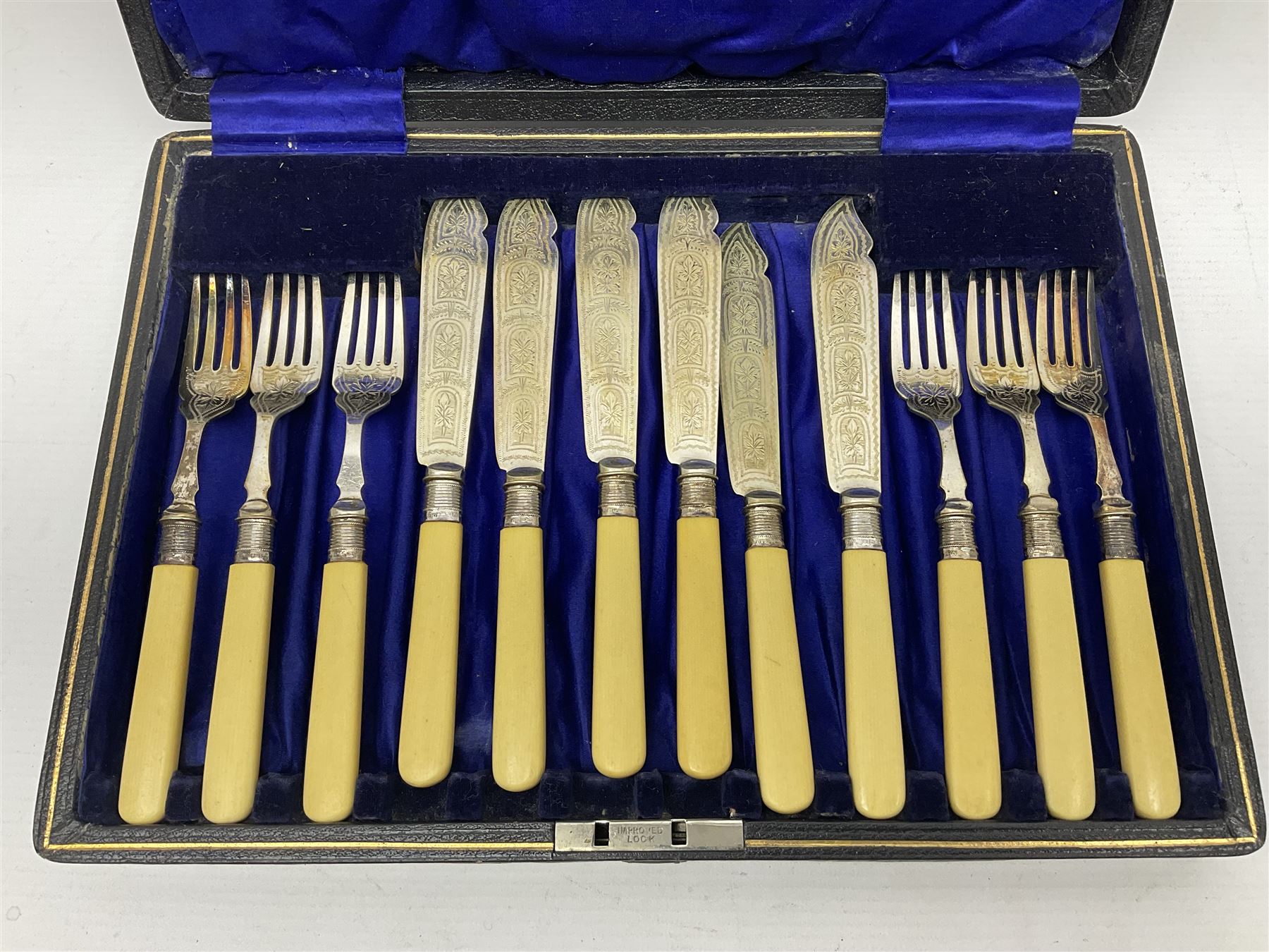 Set of six EPNS fish knives and forks with ivorine handles and hallmarked silver ferrules - Image 5 of 10