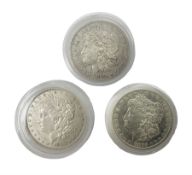 Three United States of America silver Morgan dollar coins dated 1881 O