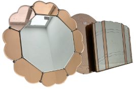 Early 20th century frameless wall mirror with copper-tainted glass (76cm x 51cm); circular frameless