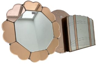 Early 20th century frameless wall mirror with copper-tainted glass (76cm x 51cm); circular frameless