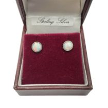 Pair of silver opal stud earrings