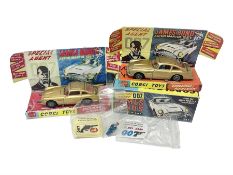 Two playworn Corgi die-cast models no.261 Special Agent 007 James Bond’s Aston Martin D.B.5 from the