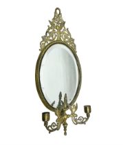 Brass oval girandole wall mirror