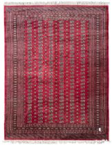 Persian Bokhara red ground carpet