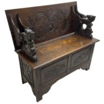 Early 20th century carved oak monk's bench