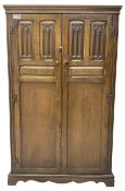 Mid-20th century Jacobean design medium oak double wardrobe or hall cupboard