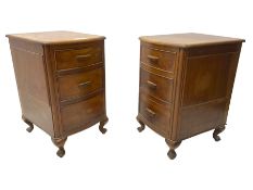 Pair of mid-20th century walnut bedside lamp chests