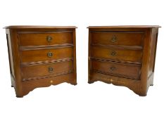 Pair of French cherry wood three-drawer bedside chests