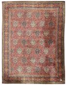 Large Persian design red ground carpet