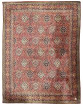 Large Persian design red ground carpet