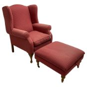 Wingback armchair upholstered in red fabric (W84cm