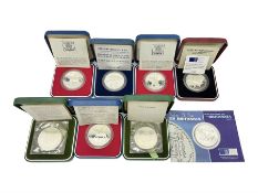 Seven The Royal Mint United Kingdom sterling silver proof crown coins