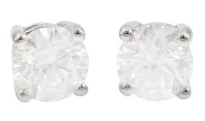 Pair of 18ct white gold round brilliant cut diamond stud earrings