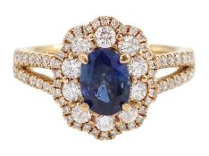 18ct rose gold oval cut sapphire and round brilliant cut diamond cluster ring