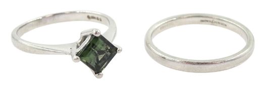 Platinum single stone square cut green tourmaline ring and a platinum wedding band