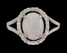 18ct white gold opal and diamond cluster ring