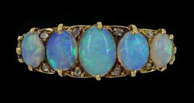 Early 20th century 15ct gold five stone graduating opal ring