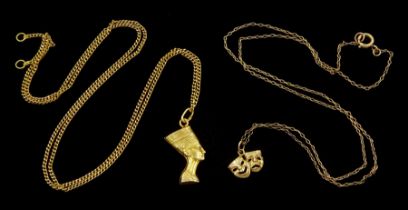 18ct gold Pharaoh pendant necklace and a 9ct gold two mask face pendant necklace