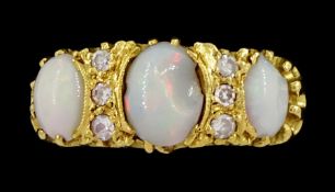 18ct gold three stone opal and six stone diamond ring