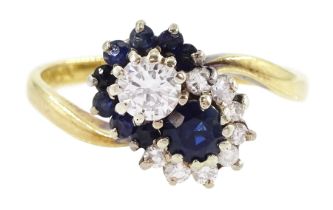 18ct gold round brilliant cut diamond and sapphire crossover ring