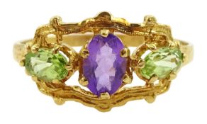 Silver-gilt three stone peridot and amethyst ring