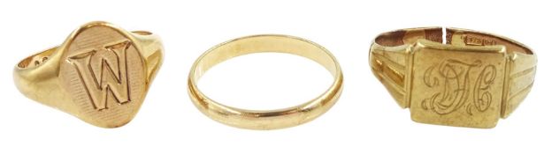 Two gold signet rings and a gold wedding band