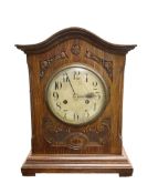 English - 20th century art nouveau period 8-day striking mantle clock in an oak case