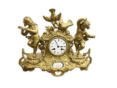 French - late 19th century 8-day spelter mantle clock depicting two dancing children and a pair of