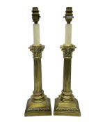 Pair of brass table lamps in the form of fluted Corinthian columns