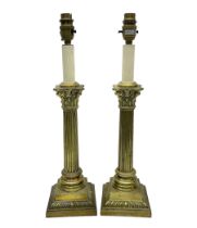 Pair of brass table lamps in the form of fluted Corinthian columns