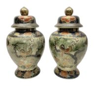 Pair of Chinese Satsuma baluster shaped lidded vases