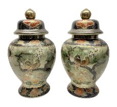 Pair of Chinese Satsuma baluster shaped lidded vases