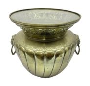 Brass jardinière with fluted rim decorated with floral sprigs