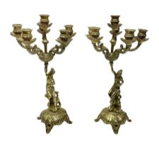 Pair of brass six branch candelabra