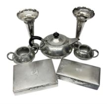 Three piece Arts and Crafts style hammered pewter tea service