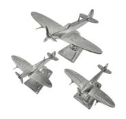 Set of three aluminium planes with rotating propellers