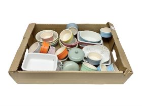 Collection of pastel coloured ramakins and pie dishes