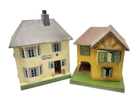 Two mid 20th century dolls houses