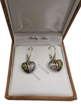 Pair of silver green amber heart pendant earrings