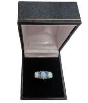 Silver-gilt three stone opal and amethyst ring