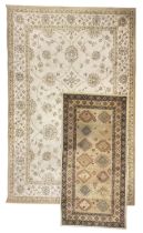 Persian design sand ground rug (232cm x 160cm); pale green ground rug (159cm x 83cm)