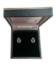 Pair of silver cubic zirconia and green stone pear drop cluster earrings