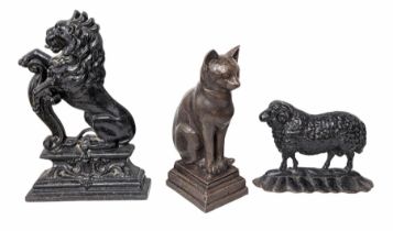 Cast Iron Door Stop in the Form of a Ram together with another doorstop in the form of a lion and a
