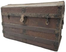 Late 19th to early 20th century leather and wood bound chest with metal fixtures