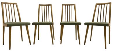 Set of four mid-20th century beech framed dining chairs