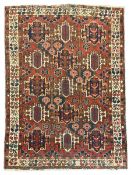 Persian crimson ground rug