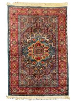 Persian design blue ground rug